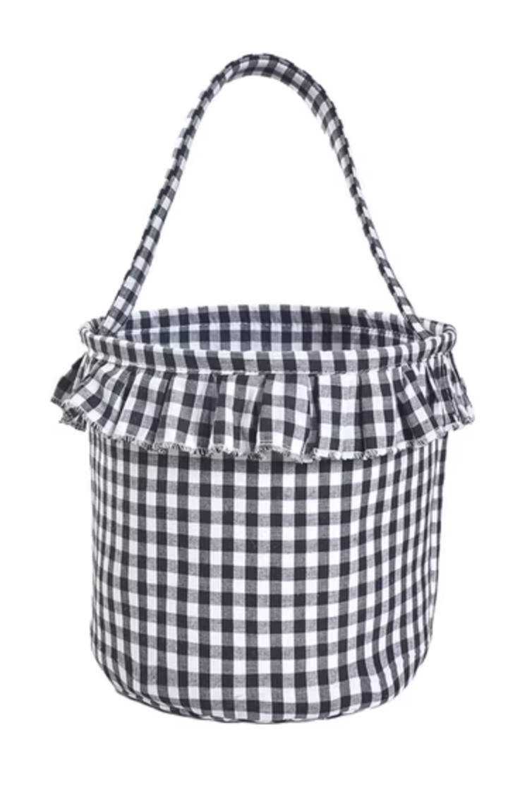 A black and white gingham check basket with a ruffled fabric trim and a single shoulder strap, shown against a plain white background.